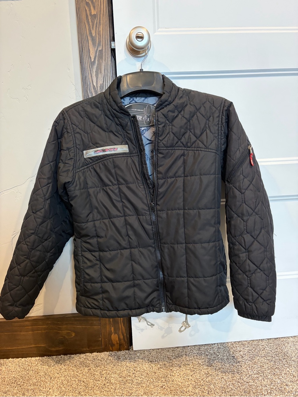 Spyder Women's Black Quilted Puffer Jacket with Subtle Logo Patch